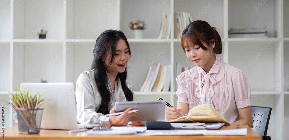 Two business people talk project strategy at office Businessman discuss project planning with colleague at modern workplace while having conversation and advice on financial data report Two business people talk project strategy at office Businessman discuss project planning with colleague at modern workplace while having conversation and advice on financial data report