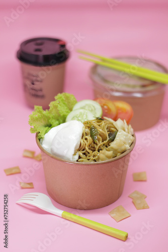 Spicy Fried Noodles With Egg And Vegetables And Blurred Background