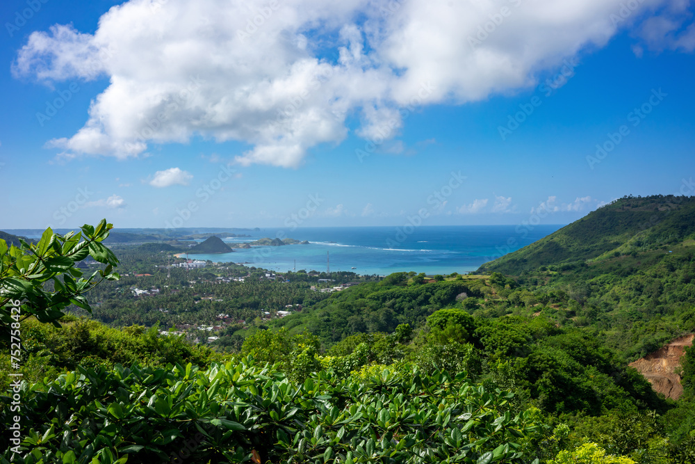 Captivating Panoramic View of Lombok's Coastal Landscape, Indonesia, Framed by Lush Greenery Captivating Panoramic View of Lombok's Coastal Landscape, Indonesia, Framed by Lush Greenery