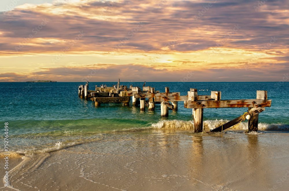 The original Jurien bay Jetty was built c1885 for Walter Padbury to ship out wool, kangaroo, cattle and horse hides. It was of timber pile and plank construction .