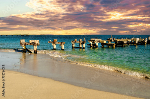Heritage Memorial Site,The original Jurien Jetty was built c1885 for Walter Padbury to ship out wool, kangaroo, cattle and horse hides. It was of timber pile and plank construction ... © Imagevixen