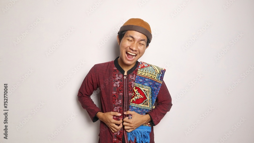 Obraz premium Asian Muslim man laughing gesture