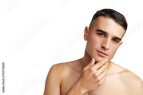 Young attractive brunet guy with perfect skin touching chin on white background