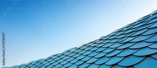 Vivid Blue Roof Gleaming with Generous Light Reflecting Off Shiny Metal Surface