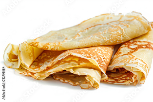 Close-up of a stack of golden brown lightly floded crepes isolated on white background