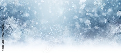 Frosty Blue Winter Wonderland with Delicate Snowflakes Falling on a White Background © Ilgun