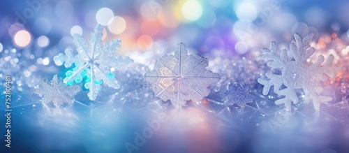 Elegant Snowflakes Cascade on a Tranquil Blue Background in a Mesmerizing Winter Display © Ilgun