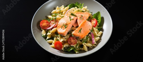Exquisite Salmon Pasta Bowl Infused with Fresh Mediterranean Vegetables