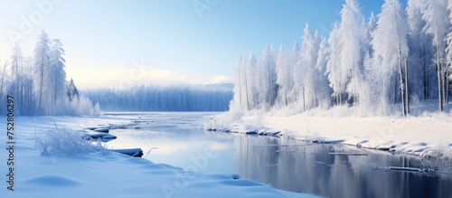 Tranquil River Flowing Through Snowy Winter Landscape, Creating a Serene Scene of Nature's Beauty © Ilgun