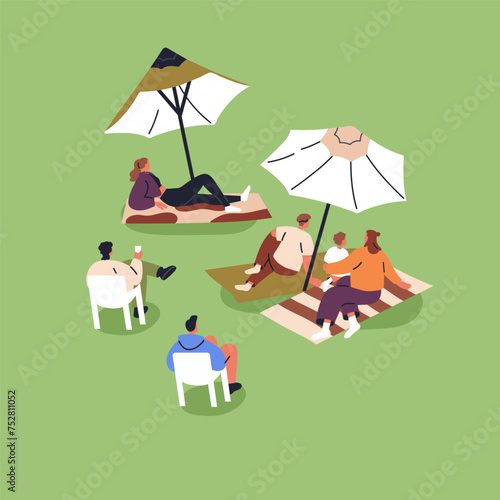 People relaxing in park on summer holiday, weekend. Outdoor leisure time in n...