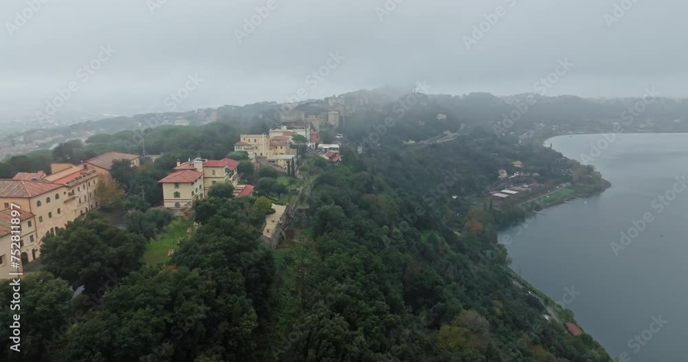 Aerial view of Castel Gandolfo Lake Albano in Italy. A beautiful city on the slopes of the mountains and a landscape of nature. High quality 4k footage Aerial view of Castel Gandolfo Lake Albano in Italy. A beautiful city on the slopes of the mountains and a landscape of nature. High quality 4k footage