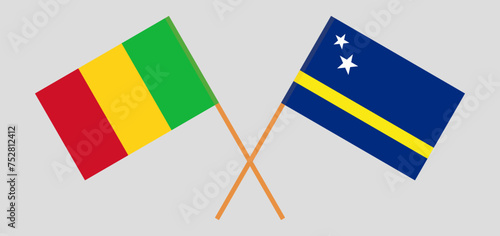 Crossed flags of Mali and Country of Curacao. Official colors. Correct proportion