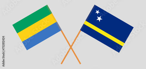 Crossed flags of Gabon and Country of Curacao. Official colors. Correct proportion