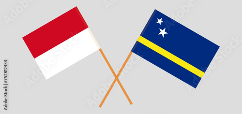 Crossed flags of Monaco and Country of Curacao. Official colors. Correct proportion