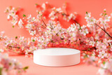 White round podium on pink background with flowers