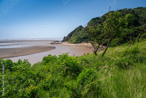 Port St Johns, umzimvubu river mouth, Wild Coast, known also as the Transkei, open beaches, steamy jungle or coastal forests. The rugged and unspoiled Coastline South Africa photo