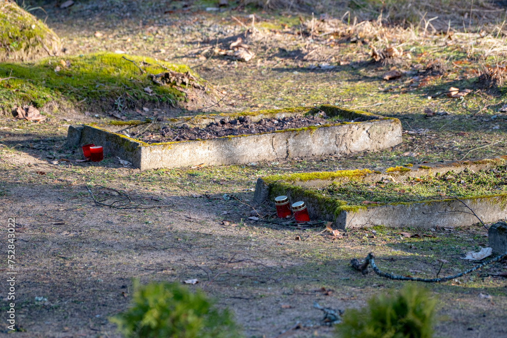 old graves in Latvia country forest cemetery old graves in Latvia country forest cemetery