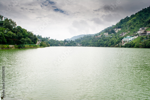 Beautiful Bhimtal Lake is a lake in the town of Bhimtal, in the Indian state of Uttarakhand. Green water lake photo