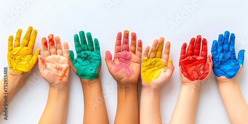 Children's hands covered with colorful paint in yellow, red, green, pink, and blue, displayed against a white background.