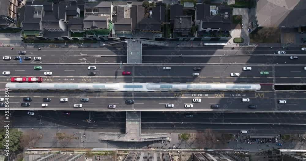 aerial top view of busy traffic on the road in the city street of Chengdu China, aerial urban traffic time-lapse aerial top view of busy traffic on the road in the city street of Chengdu China, aerial urban traffic time-lapse