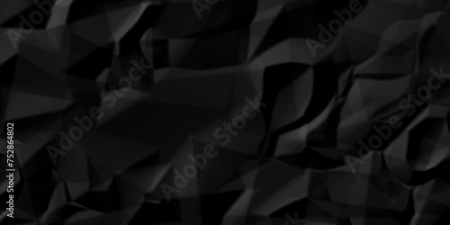 Dark black wrinkly backdrop paper background. panorama grunge wrinkly paper texture background, crumpled pattern texture. black paper crumpled texture. black fabric crushed textured crumpled. © MdLothfor