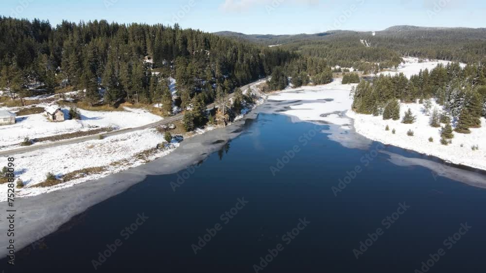 Aerial winter view of Beglika Reservoir covered with ice, Pazardzhik Region, Bulgaria Aerial winter view of Beglika Reservoir covered with ice, Pazardzhik Region, Bulgaria