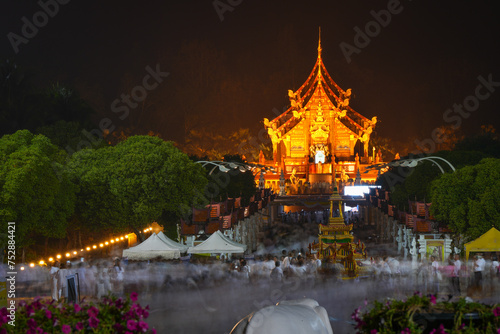 A lot of people come to worship Buddha relics celebration and do candlelight procession  at Hot kham luang royal park rajapruek chiangmai thailand December 5 2024 photo