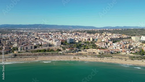 Wallpaper Mural Panoramic aerial view of Tarragona city. Old costal city situated in Catalonia. Famous travel destination. View of Miracle Beach. Panoramic view of all city. Turquoise water. Drone going forward.  Torontodigital.ca