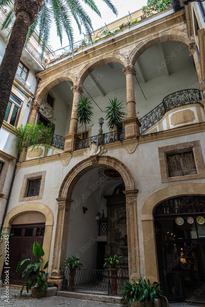 Inner courtyard an old classic building, Palermo, Sicily, Italy