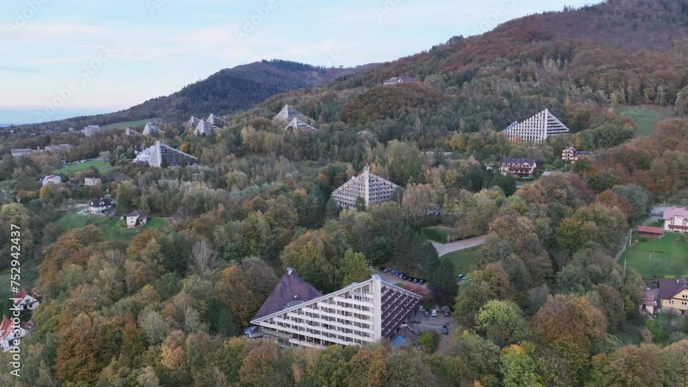 Scenery of the town and health resort in Ustron on the hills of the Silesian Beskids, Poland. Aerial drone view of beskid mountains in Ustron. Ustron Aerial View. Scenery of the town and health resort in Ustron on the hills of the Silesian Beskids, Poland. Aerial drone view of beskid mountains in Ustron. Ustron Aerial View.