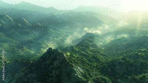 Passage over scenic, sunlit evergreen mountains shrouded in mist, aerial shot photo