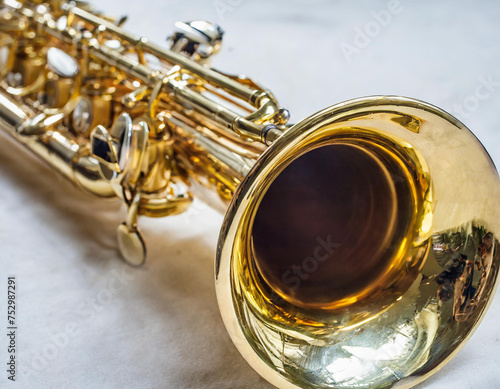 Golden saxophone on white background