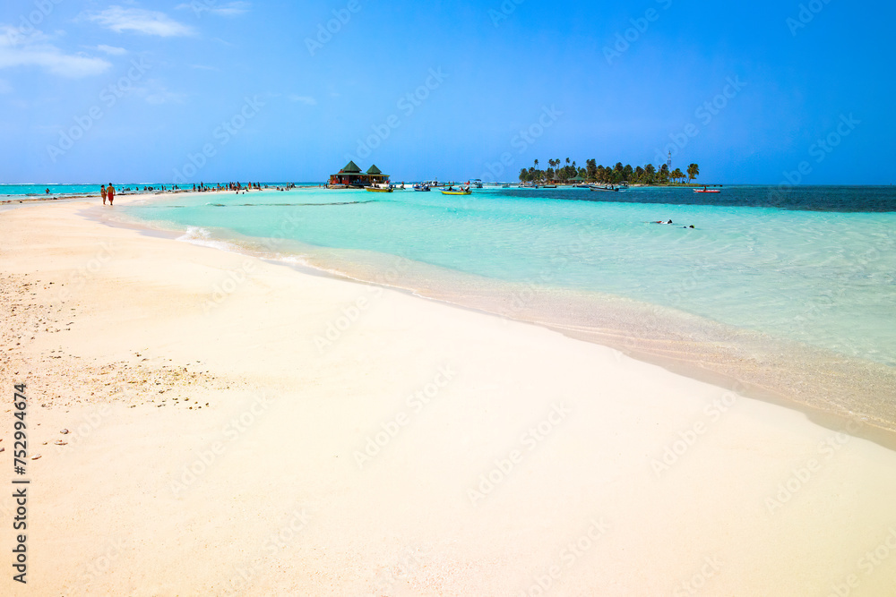 Clear waters and white sand on a key in front of San Andres island, Colombia