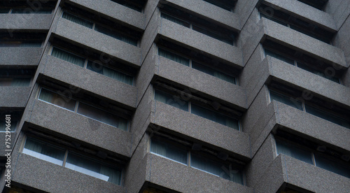 Exterior building wall of abstract concrete geometric pattern, an example of brutalistic architecture. 
Brutalism as an architecture style in Quebec city in Canada. Brutalist architecture Canada.