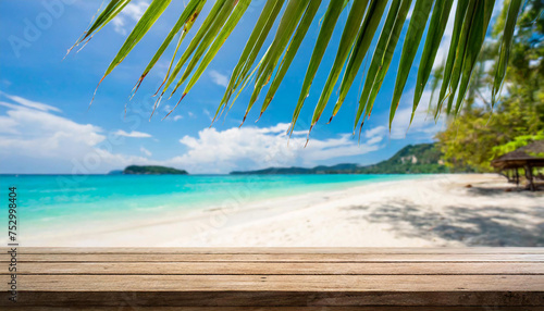 Empty wide Table top wooden bar with blurred beautiful beach scene background coconut leaf on the frame for product display mockup outside summer day time, Resort on nature sea