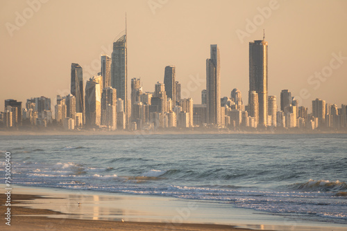 Skyscrapers on the beach during sunset in the city of Gold Coast, Queensland, Australia photo