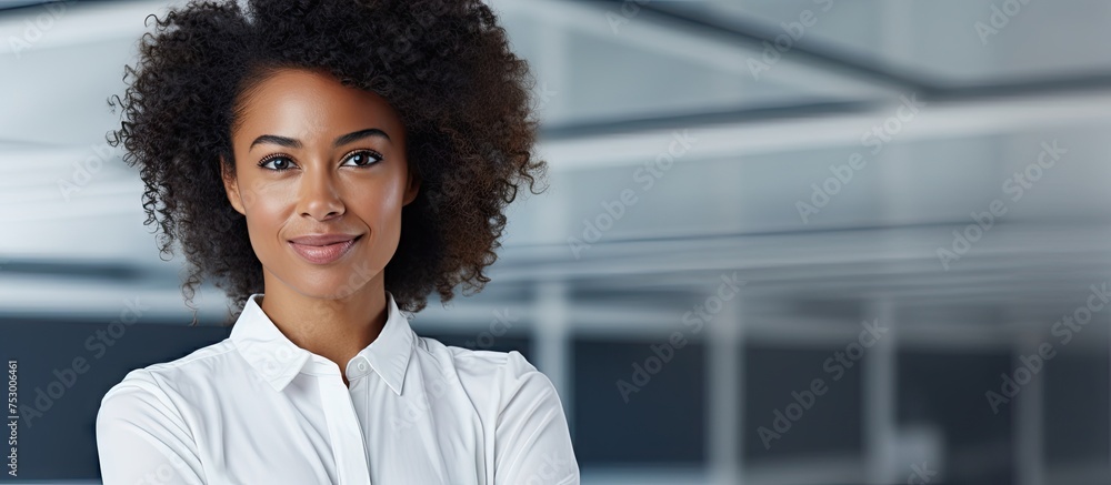 Confident Afro-Latina Woman in White Shirt Embracing Her Natural Curly Hair - obrazy, fototapety, plakaty 
