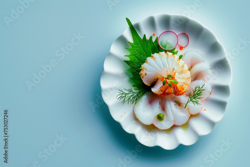 A scallop sashimi Carpaccio. Raw fish. Light blue color background, top view. Space for text.