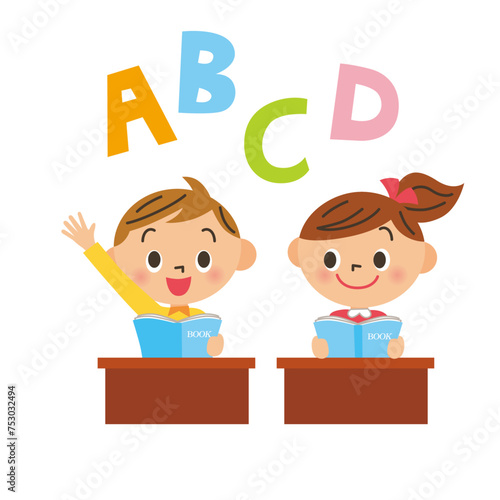 机に座って英語の学習をする子供達