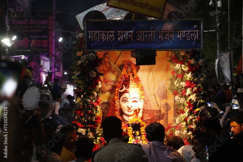 people at the procession of lord shiva in ujjain city