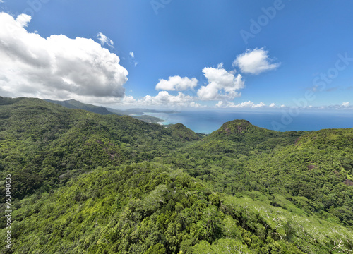 panoramic view from a drone of the sea bays and beaches on a sunny day of the Seychelles islands