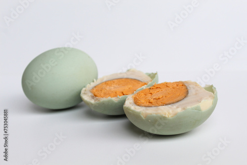 Halved salted egg, blue color shell from duck egg. Isolated on white background