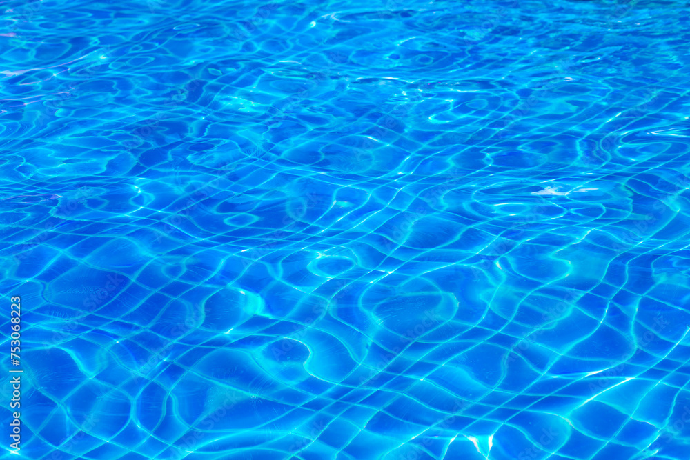 Swimming Pool Surface With Light Reflection and Water Ripple Patterns