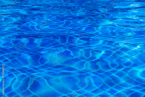 Swimming Pool Surface With Light Reflection and Water Ripple Patterns