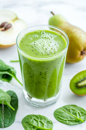  delicious Kiwi pear smoothie with spinach , for a styled food photography shoot on a white marble kitchen