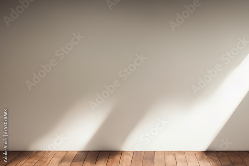 empty wall and wooden floor with glare from the window