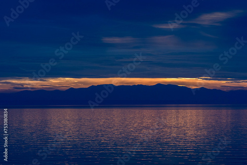 Serenity at sundown. Captivating reflections in the Aegean sea.