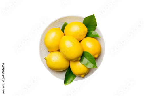 Fresh cutted lemon and whole lemons over round plate isolated on white background. Food and drink ingredients preparing. healthy eating theme top view with copy space