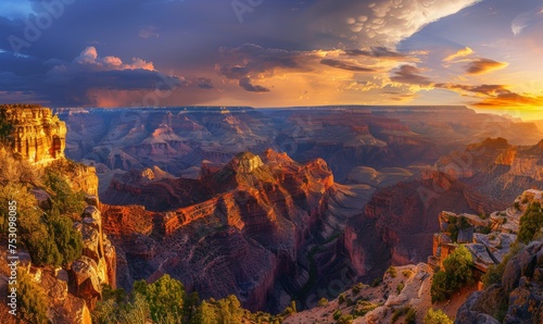 Colorful canyon landscape as the sun dips below the horizon, casting a golden glow over the rocky terrain and lush vegetation