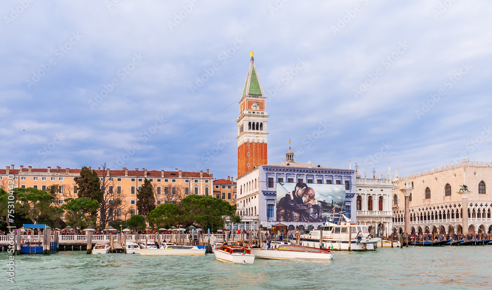 Doge's Palace, Campanile and water taxis in Venice in Veneto, Italy - obrazy, fototapety, plakaty 